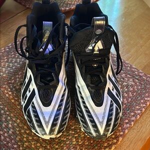 Adidas Black and White Athletic Shoes with Dynamic Stripes see all pic.